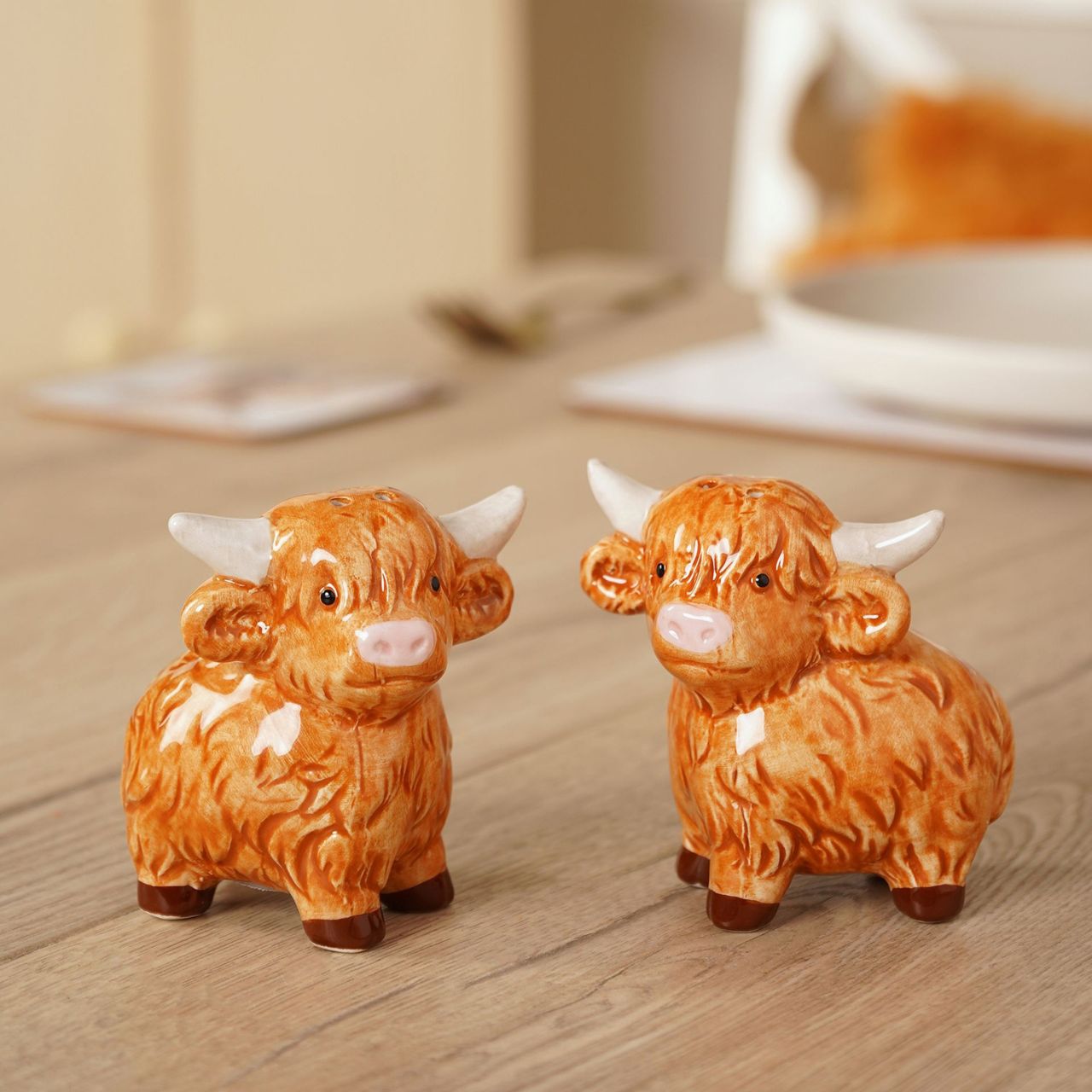 Crafted with meticulous detail, these whimsical shakers will delight guests and spark conversation. Their design captures the essence of majestic highland cows, making them a perfect gift for animal lovers or anyone who appreciates rustic charm.