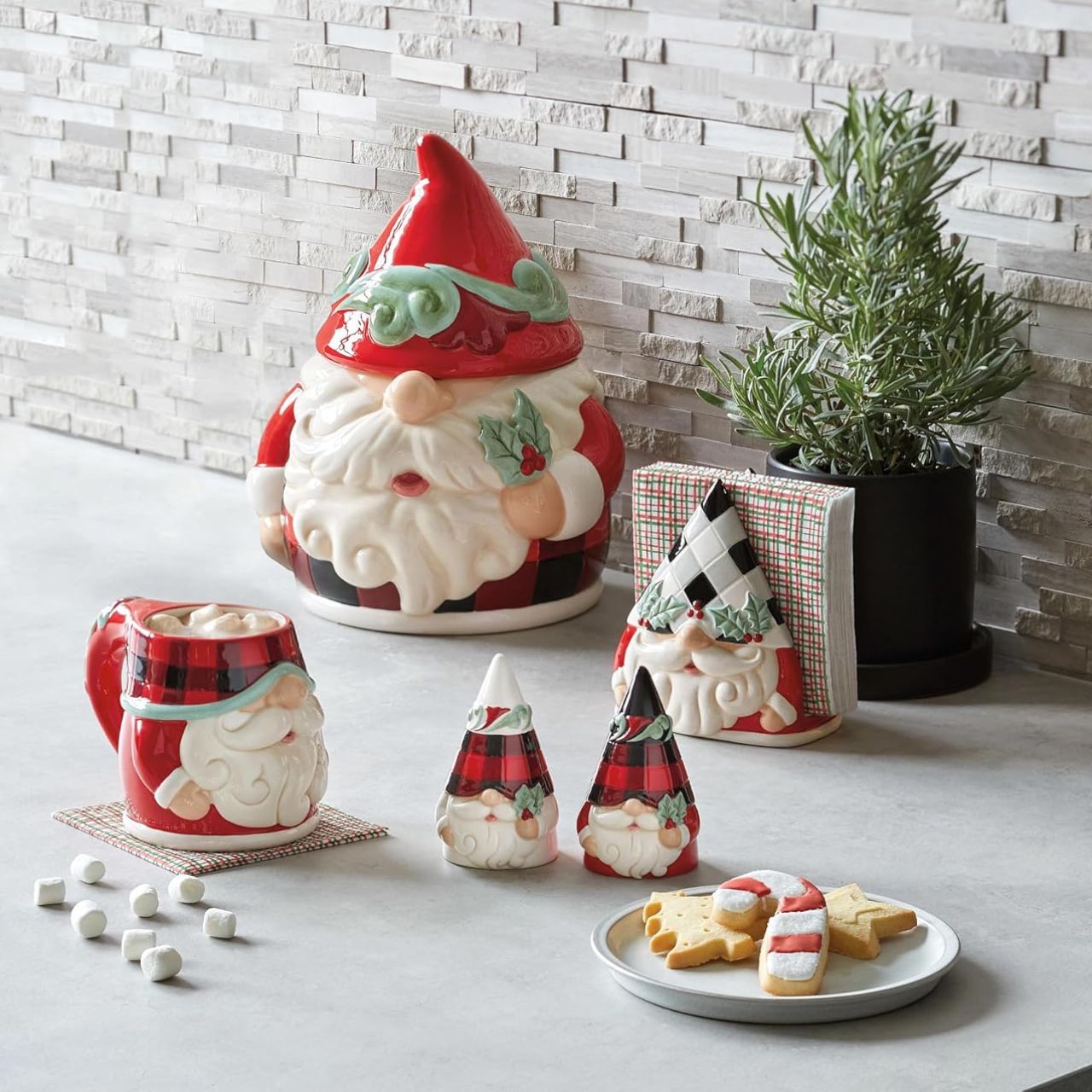 No one knows gnomes like Jim Shore! Creating yet another gorgeous guardian, Jim Shore has put a playful spin on Christmas. This Holiday Glen holiday gnome doubles as a cookie stash jar and features a gnome who may or may not want to steal your cookies.