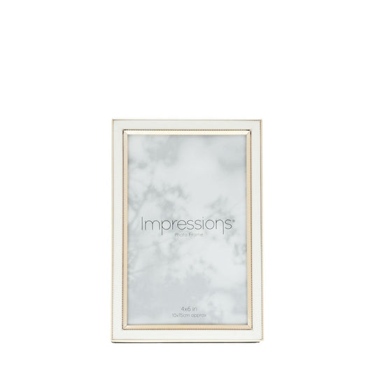 Gold & White Epoxy Photo Frame 4" x 6"  A gold and white epoxy photo frame.  This dazzling frame adds instant style to the home and perfectly frames photographs.