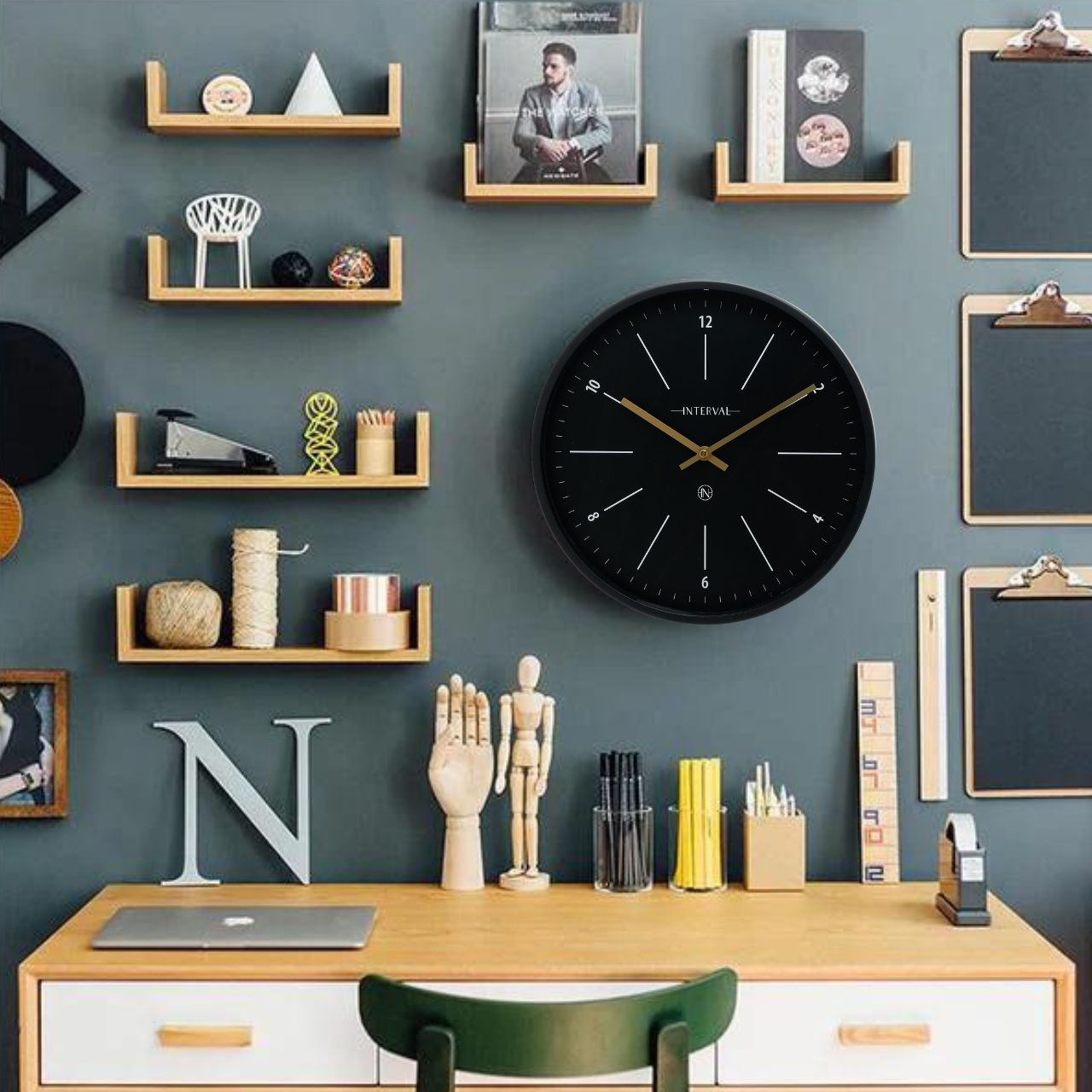Introducing the Interval Metal Wall Clock in Black, a sleek and contemporary timepiece that combines functionality with modern design.
