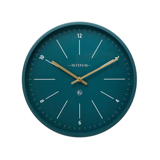Introducing the Interval Metal Wall Clock in Emerald, a sleek and contemporary timepiece that combines functionality with modern design.