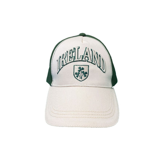 A clean baseball cap with Shamrock crest styling in cream and bottle green. Comfortable cotton construction for everyday wear. A timeless accessory.