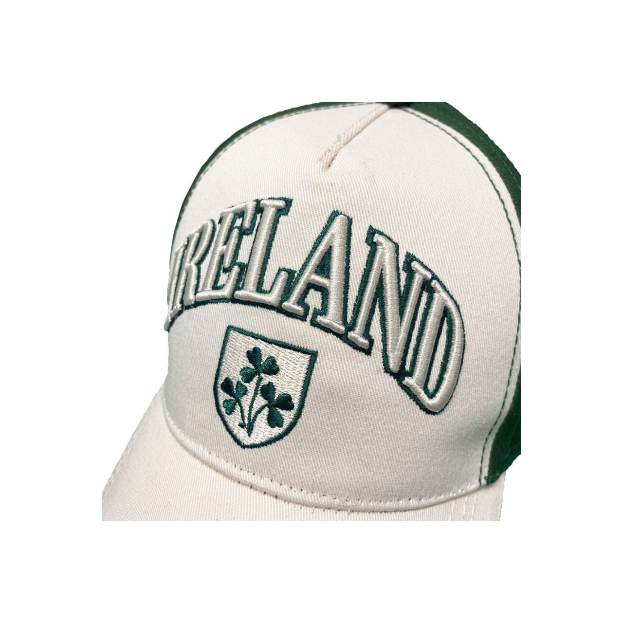 A clean baseball cap with Shamrock crest styling in cream and bottle green. Comfortable cotton construction for everyday wear. A timeless accessory.
