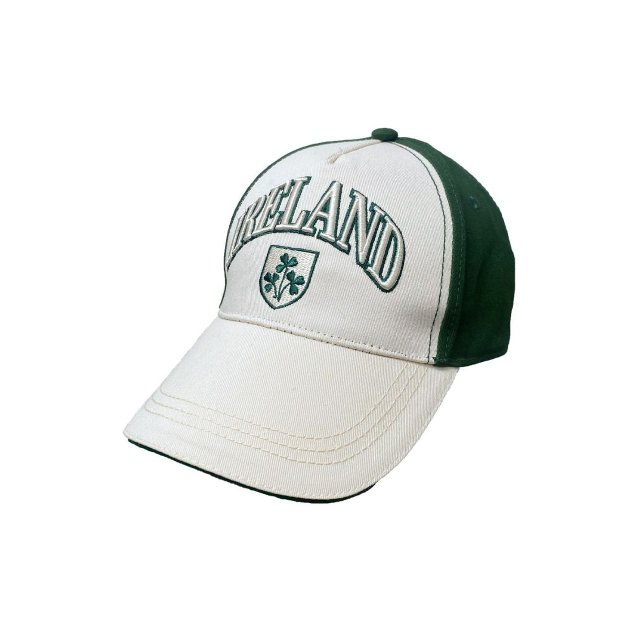 A clean baseball cap with Shamrock crest styling in cream and bottle green. Comfortable cotton construction for everyday wear. A timeless accessory.