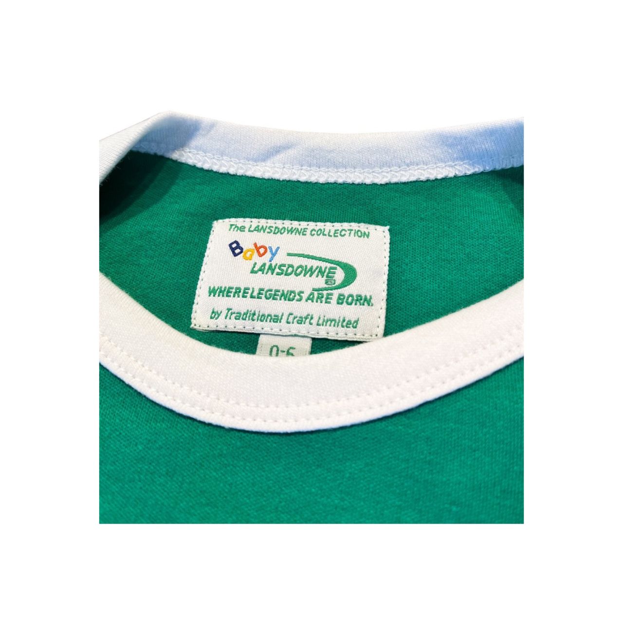 A soft baby vest with Three Shamrocks styling in emerald. Comfortable cotton makes dressing easy for everyday wear. Ideal for layering through the seasons.