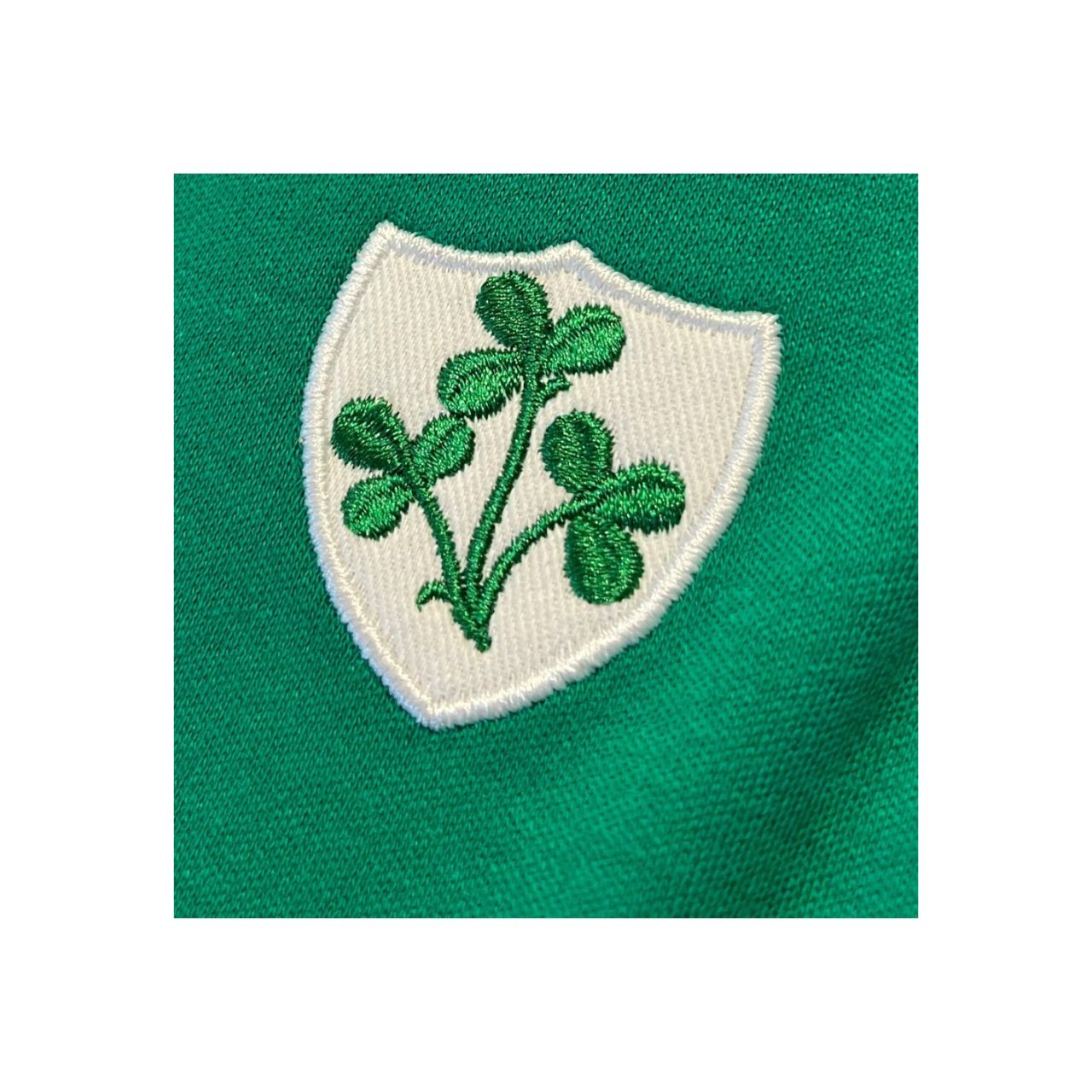 A soft baby vest with Three Shamrocks styling in emerald. Comfortable cotton makes dressing easy for everyday wear. Ideal for layering through the seasons.