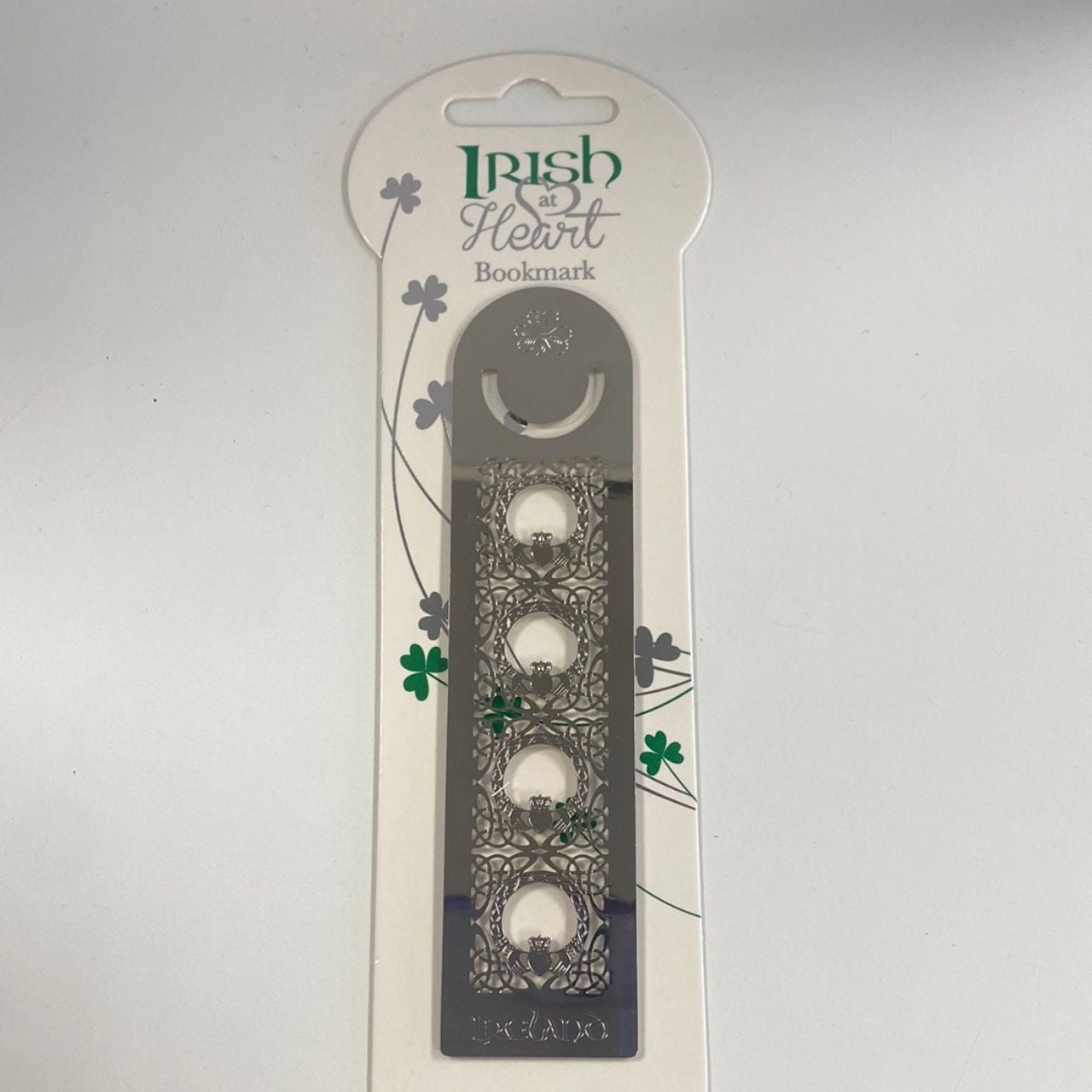 Discover the rich heritage of Ireland with our Irish At Heart Claddagh Bookmark. Crafted with intricate details, this bookmark showcases traditional Irish symbolism, adding a touch of elegance to any book or reading material. Perfect for honouring your love of literature and Irish culture.