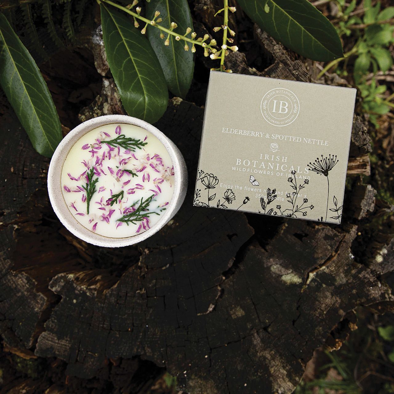 Transform your space into a serene haven with the Irish Botanicals Elderberry and Spotted Nettle Candle. Featuring real dried flowers, this candle adds an authentic touch to your sensory experiences. Poured into a stylish, textured container, it's perfect for bringing elegance and tranquillity to any room.