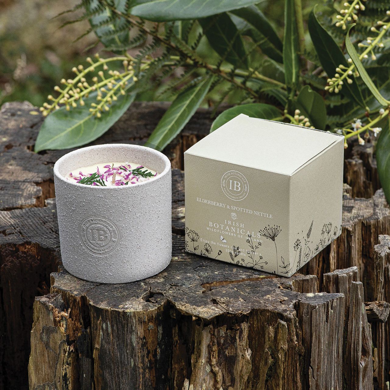 Transform your space into a serene haven with the Irish Botanicals Elderberry and Spotted Nettle Candle. Featuring real dried flowers, this candle adds an authentic touch to your sensory experiences. Poured into a stylish, textured container, it's perfect for bringing elegance and tranquillity to any room.