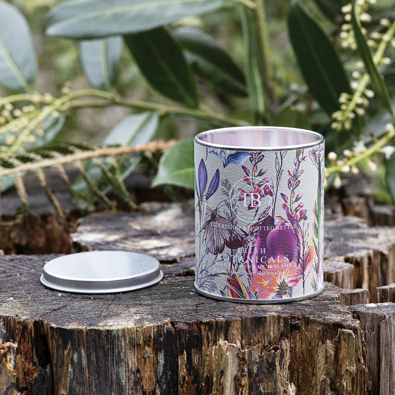 Expand your offerings with the Irish Botanicals Elderberry and Spotted Nettle Tin Candle, featuring harmonious Irish fragrances complemented by real dried flowers. Encased in an eye-catching, decorative tin, this candle combines portability with sophistication, appealing to customers seeking elegance and relaxation