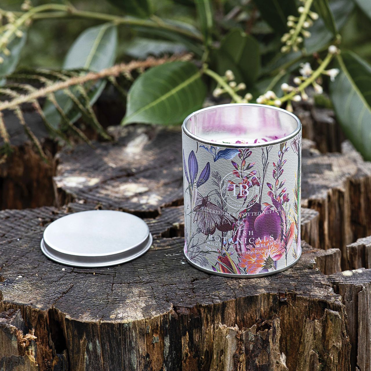 Expand your offerings with the Irish Botanicals Elderberry and Spotted Nettle Tin Candle, featuring harmonious Irish fragrances complemented by real dried flowers. Encased in an eye-catching, decorative tin, this candle combines portability with sophistication, appealing to customers seeking elegance and relaxation