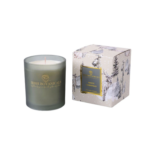 Experience the serene elegance of the Irish Botanicals White Christmas Candle, designed to fill your home with a refined festive ambiance.