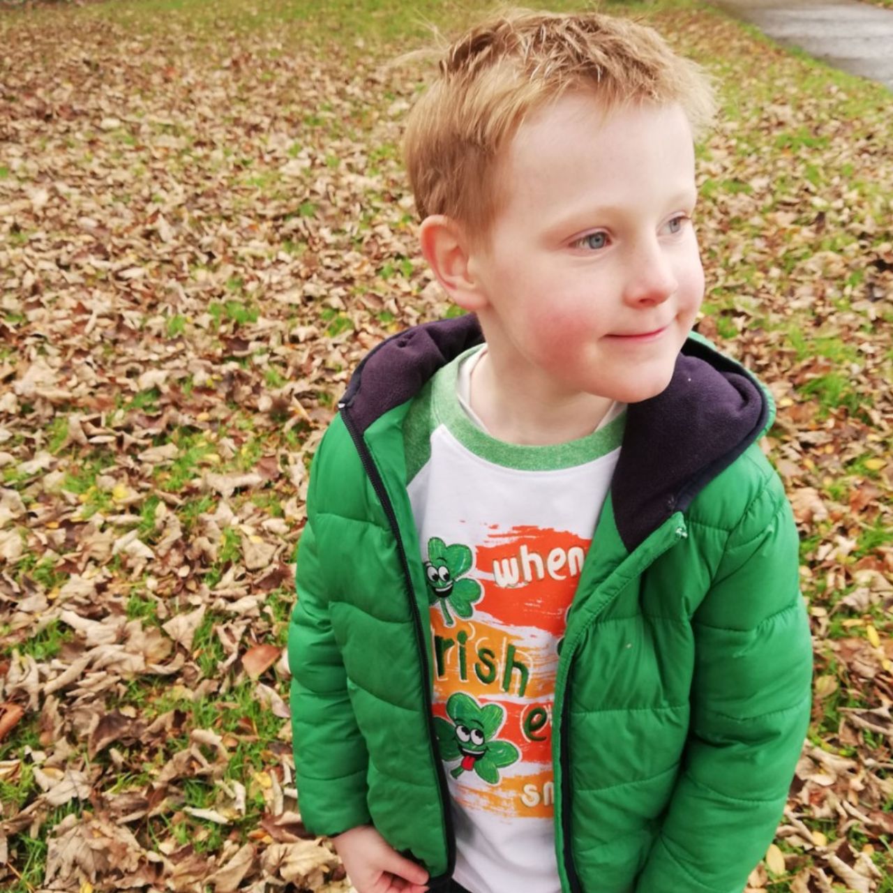 White & Green Grindle Irish Eyes Raglan Kids T-shirt  This white and green grindle kids T-shirt is part of the Traditional Craft Official Collection. This raglan style T-shirt is a relaxed fit and features embroidered shamrocks and wording over print. The classic phrase reads "When Irish eyes are smiling".