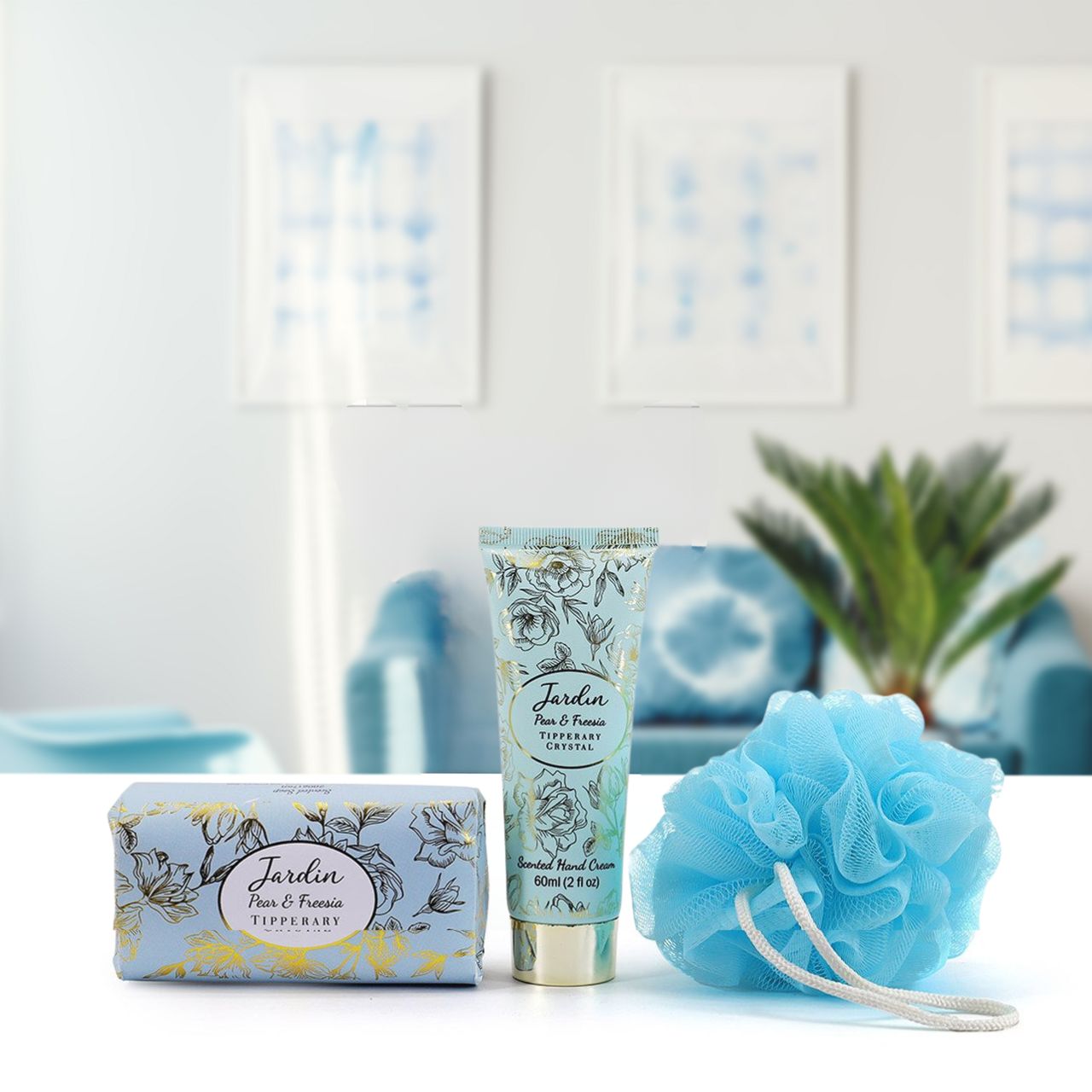 Tipperary Crystal Jardin Toiletry Bag Set - Pear & Freesia  The scent of the worlds most exquisite roses with hints of lemon. This high-quality material toiletry bag includes a handcream, bar of soap and exfoliating Loofah.