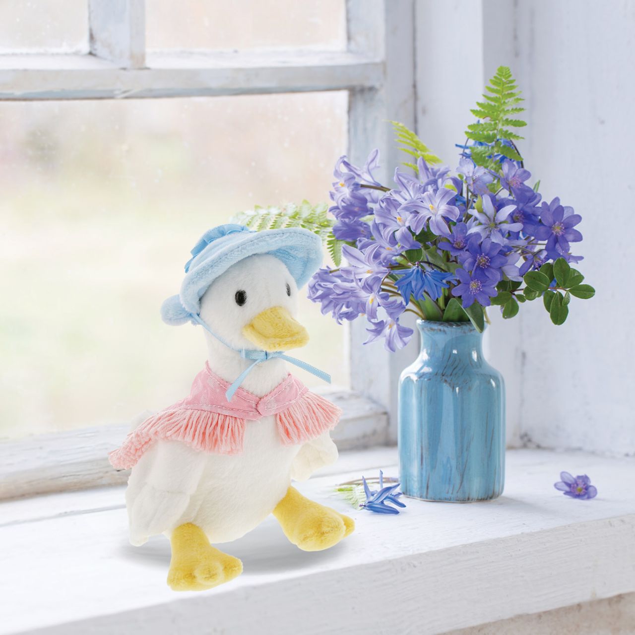 Jemima Puddle-Duck Small Peter Rabbit Collection  This Jemima Puddle-Duck soft toy is made from beautifully soft fabric and is dressed in clothing exactly as illustrated by Beatrix Potter. With her signature beautiful bonnet and shawl.