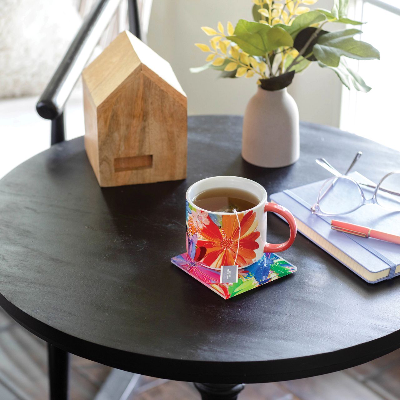Jessi Raulet Garden & Groove Coaster Set of 4 by Etta Vee  Artist, designer and art influencer, Jessi Raulet, is known for her colourful and bold designs. Keep the table clean and cool with these absolutely electric hued acrylic coasters. These come in their on gift box making a great gift for a first home or even a self purchase.