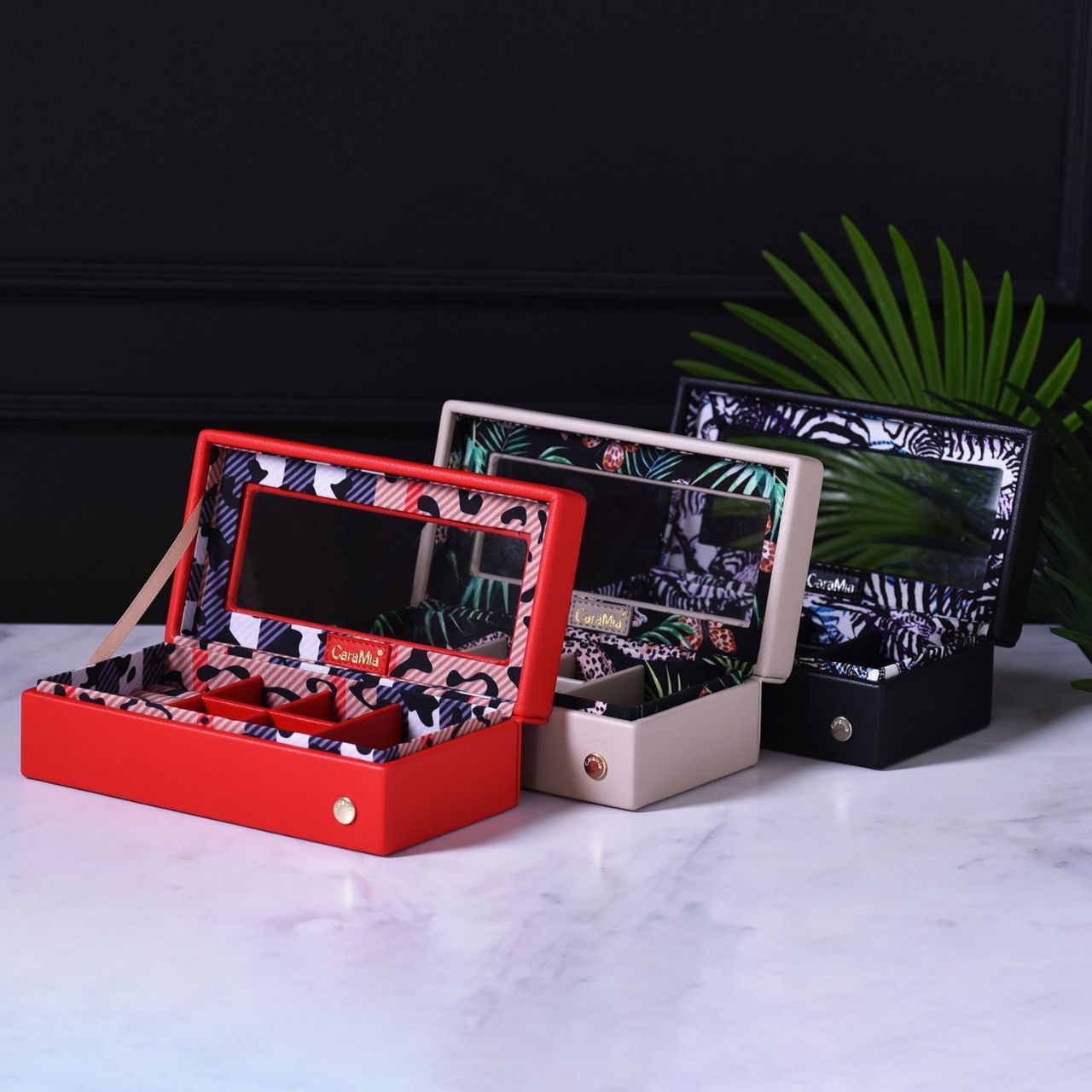 This striking jewellery case features a soft velvet interior.