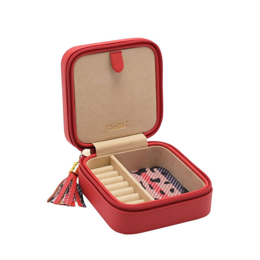 This striking jewellery case features a soft velvet interior with statement 'catwalk' print and matt red, faux leather exterior.
