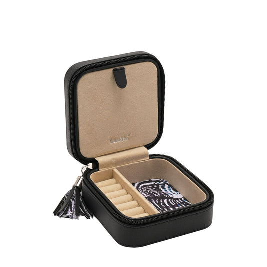 This striking jewellery case features a soft velvet interior with statement 'Zebracrossing' print and matt black, faux leather exterior.