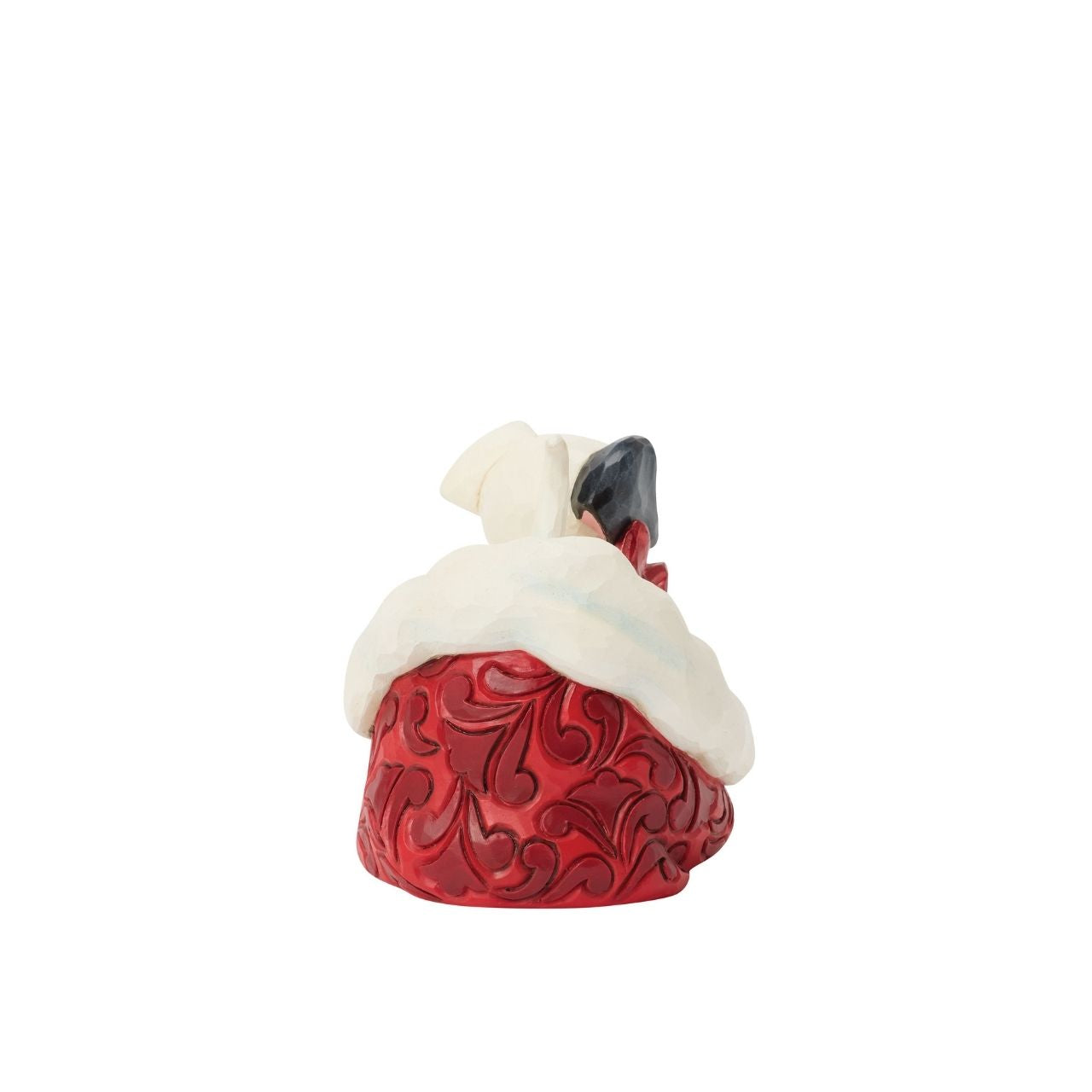 One of Disney's 101 playful dalmatians peeks out from a Santa hat in this adorable Jim Shore.