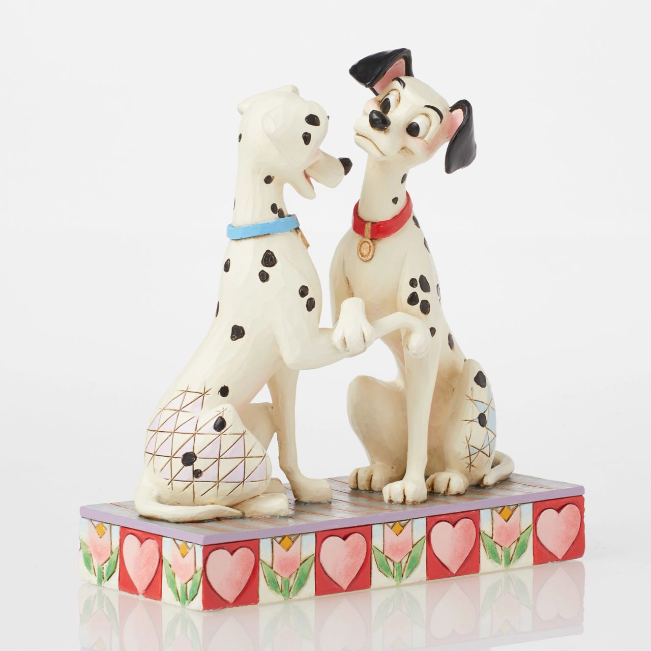 Disney's Pongo and Perdita from 101 Dalmatians show their puppy love in this sweet piece from the Disney Traditions by Jim Shore collection. Hand crafted and painted, this piece is perfect for Valentines Day, engagements, weddings and anniversaries.