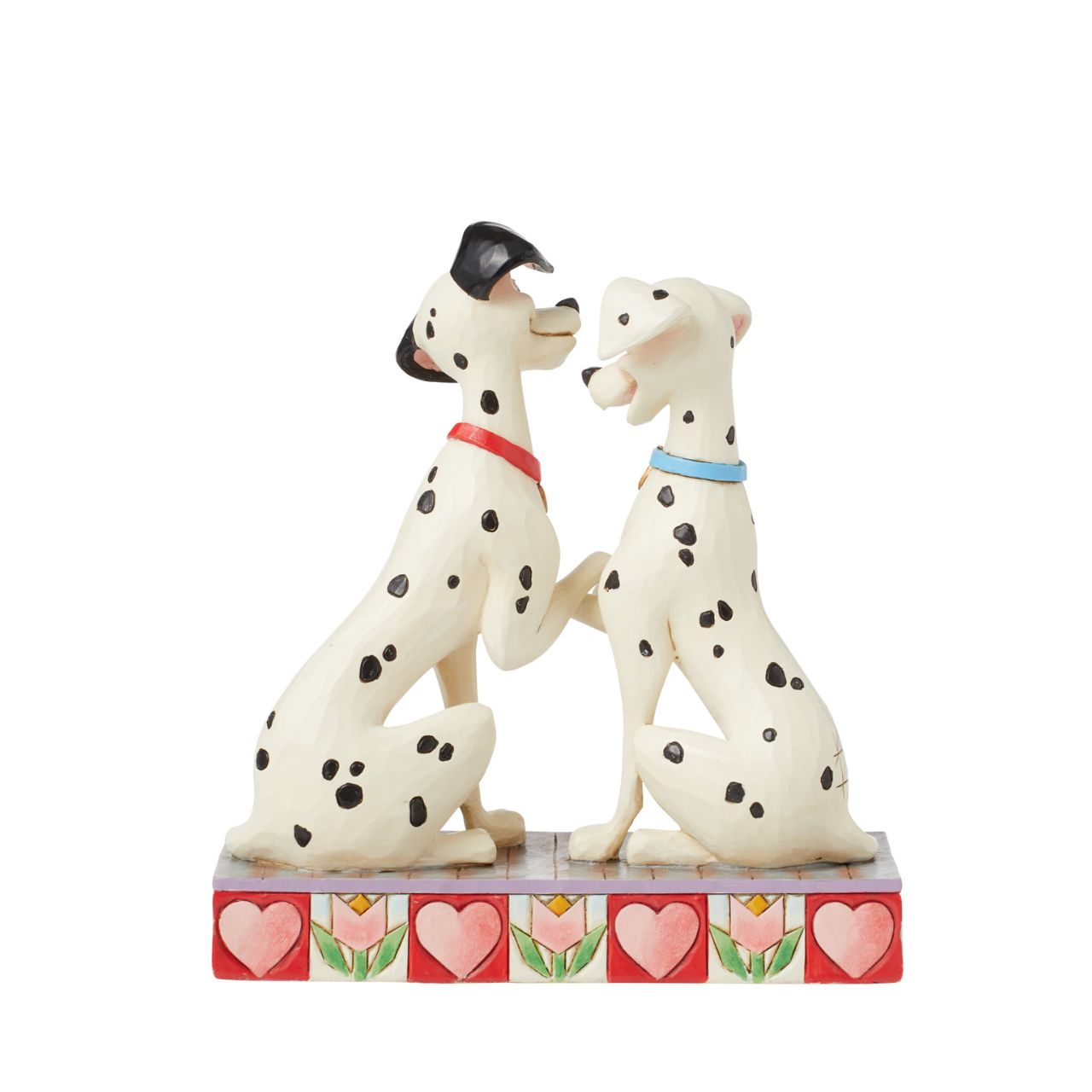 Disney's Pongo and Perdita from 101 Dalmatians show their puppy love in this sweet piece from the Disney Traditions by Jim Shore collection. Hand crafted and painted, this piece is perfect for Valentines Day, engagements, weddings and anniversaries.
