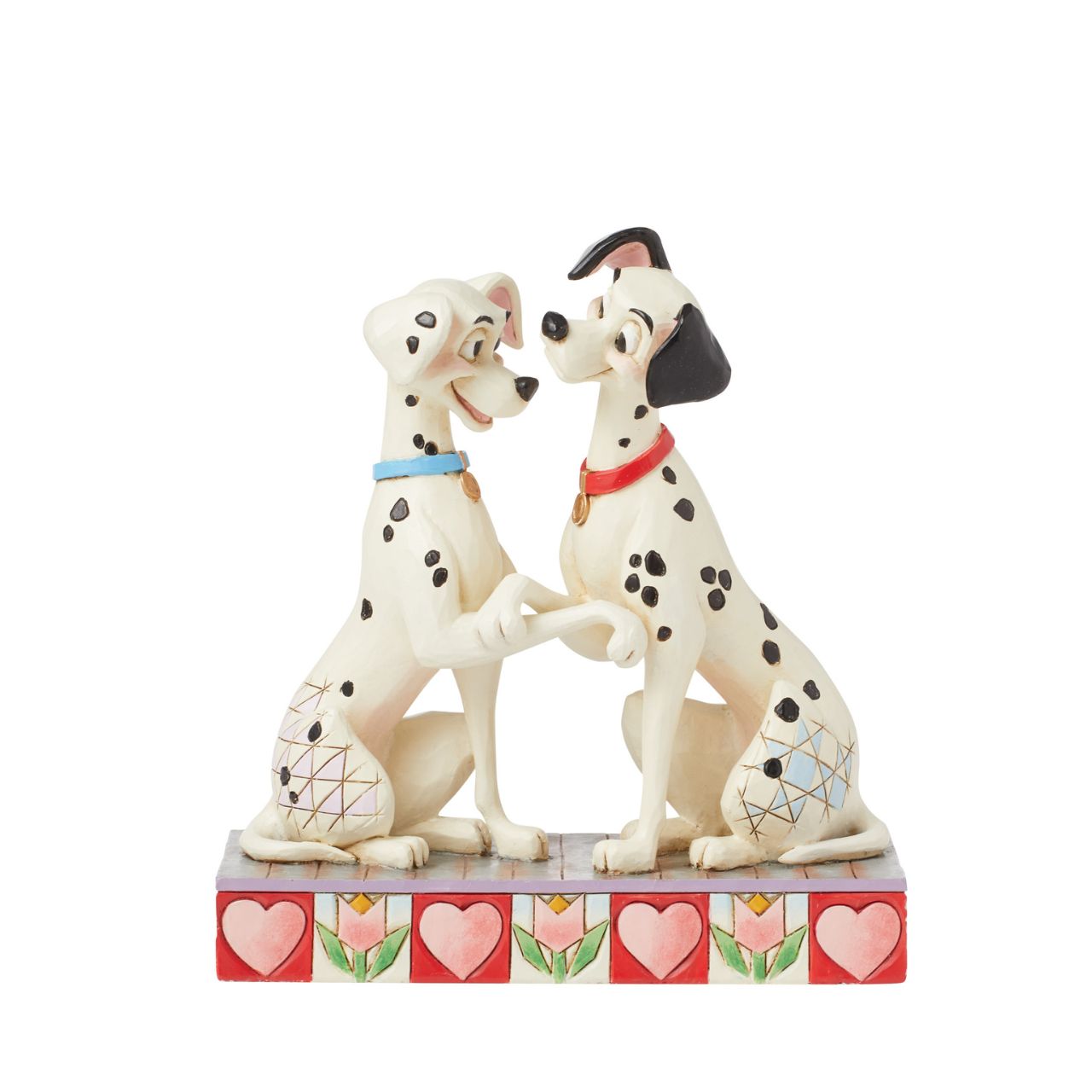 Disney's Pongo and Perdita from 101 Dalmatians show their puppy love in this sweet piece from the Disney Traditions by Jim Shore collection. Hand crafted and painted, this piece is perfect for Valentines Day, engagements, weddings and anniversaries.