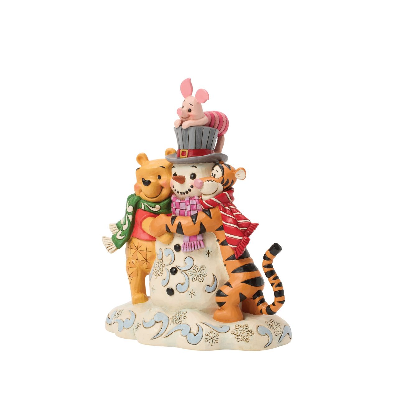 Pooh, Tiger, and Piglet build winter magic together in this cosy Jim Shore design. With bright scarves, rosy cheeks, and a jolly snowman, the scene captures the charm of snowy adventures and the sweetness of friendship with Jim Shore's iconic style.