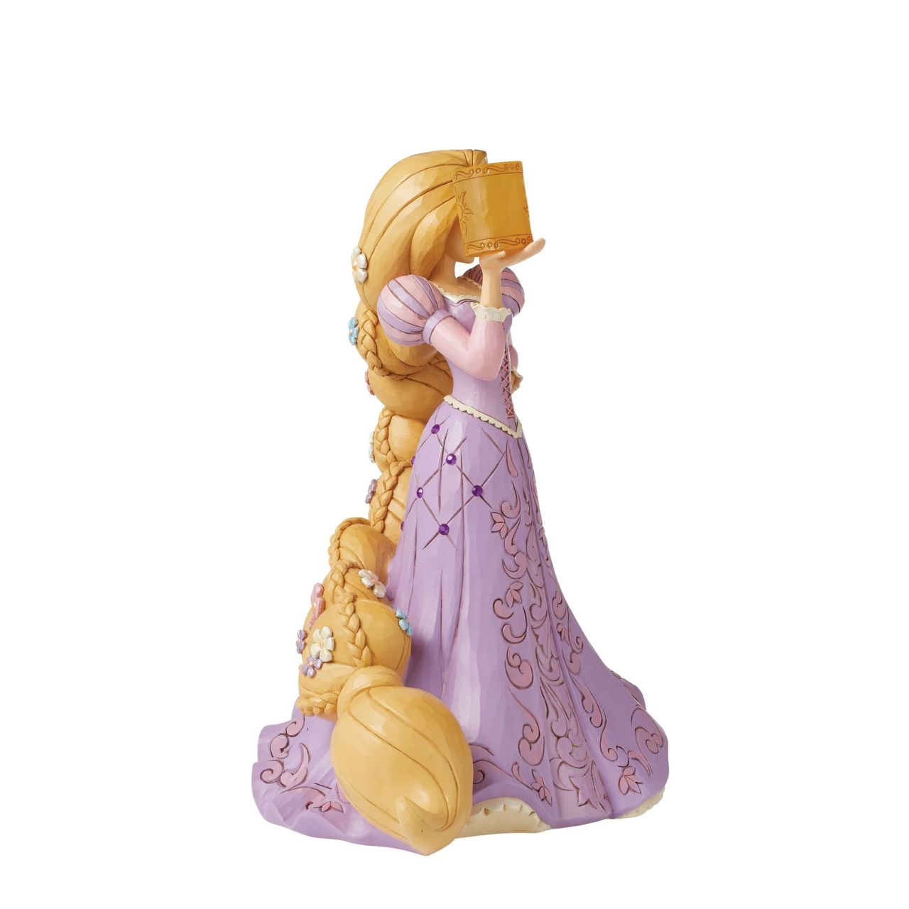 The beautiful dreamer that is Rapunzel from Disney's Tangled has now been recreated by artist Jim Shore as part of his deluxe Disney Traditions collection. Holding a clear resin lantern, Rapunzel is adorned with flowers in her hair and jewels in her dress, making her a truly breath-taking piece.