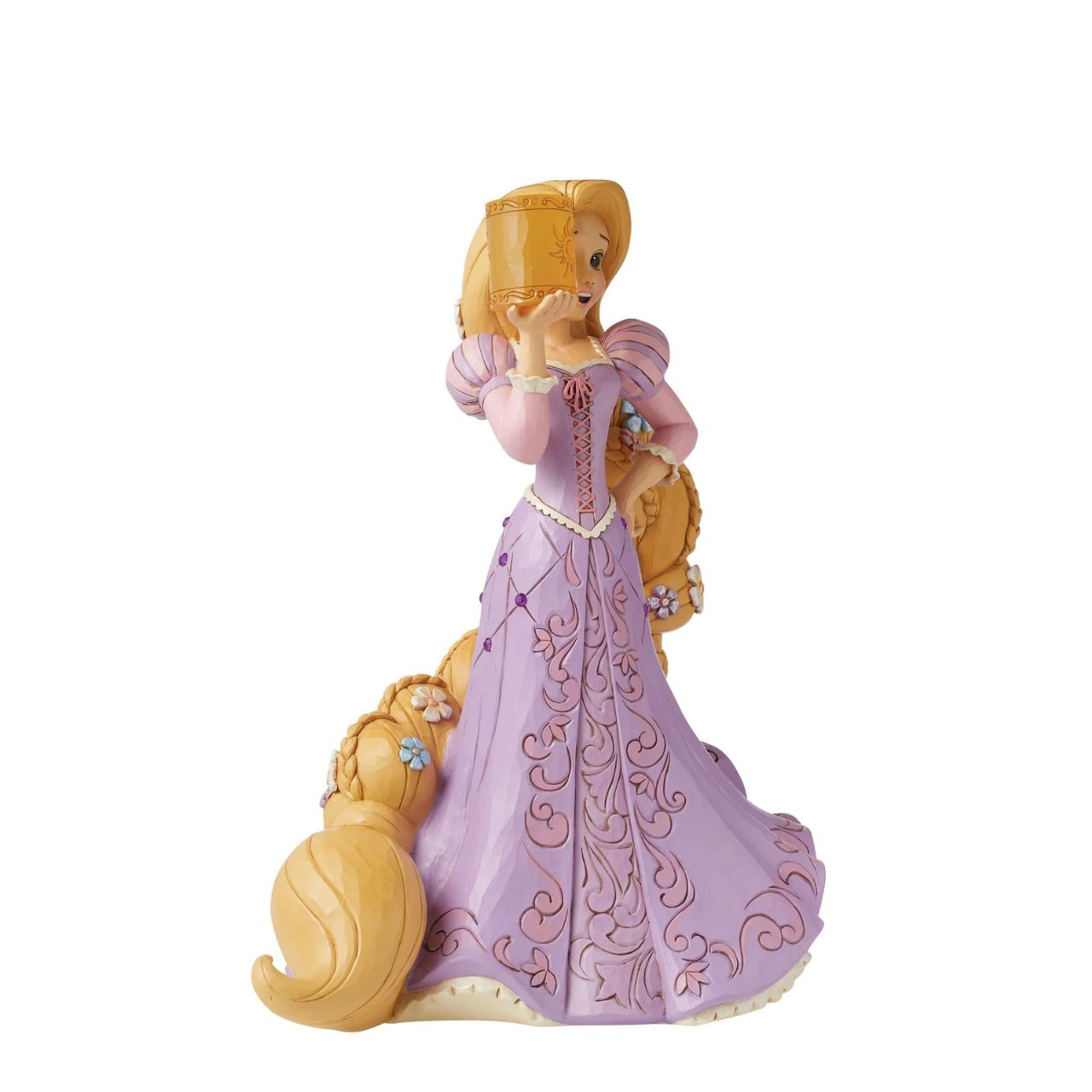 The beautiful dreamer that is Rapunzel from Disney's Tangled has now been recreated by artist Jim Shore as part of his deluxe Disney Traditions collection. Holding a clear resin lantern, Rapunzel is adorned with flowers in her hair and jewels in her dress, making her a truly breath-taking piece.