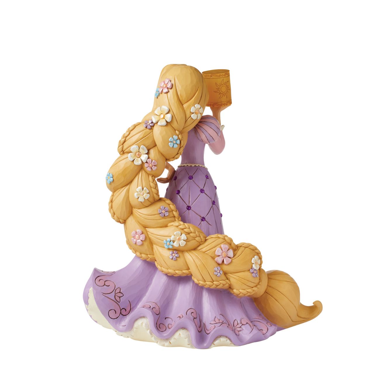The beautiful dreamer that is Rapunzel from Disney's Tangled has now been recreated by artist Jim Shore as part of his deluxe Disney Traditions collection. Holding a clear resin lantern, Rapunzel is adorned with flowers in her hair and jewels in her dress, making her a truly breath-taking piece.