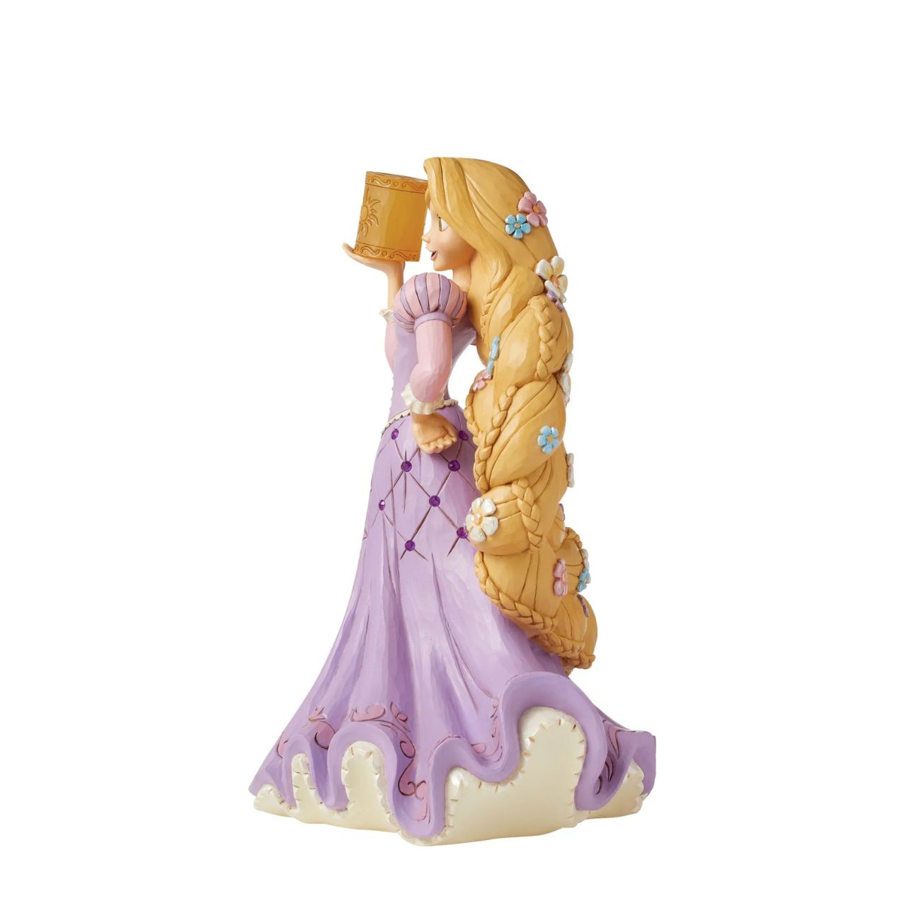 The beautiful dreamer that is Rapunzel from Disney's Tangled has now been recreated by artist Jim Shore as part of his deluxe Disney Traditions collection. Holding a clear resin lantern, Rapunzel is adorned with flowers in her hair and jewels in her dress, making her a truly breath-taking piece.