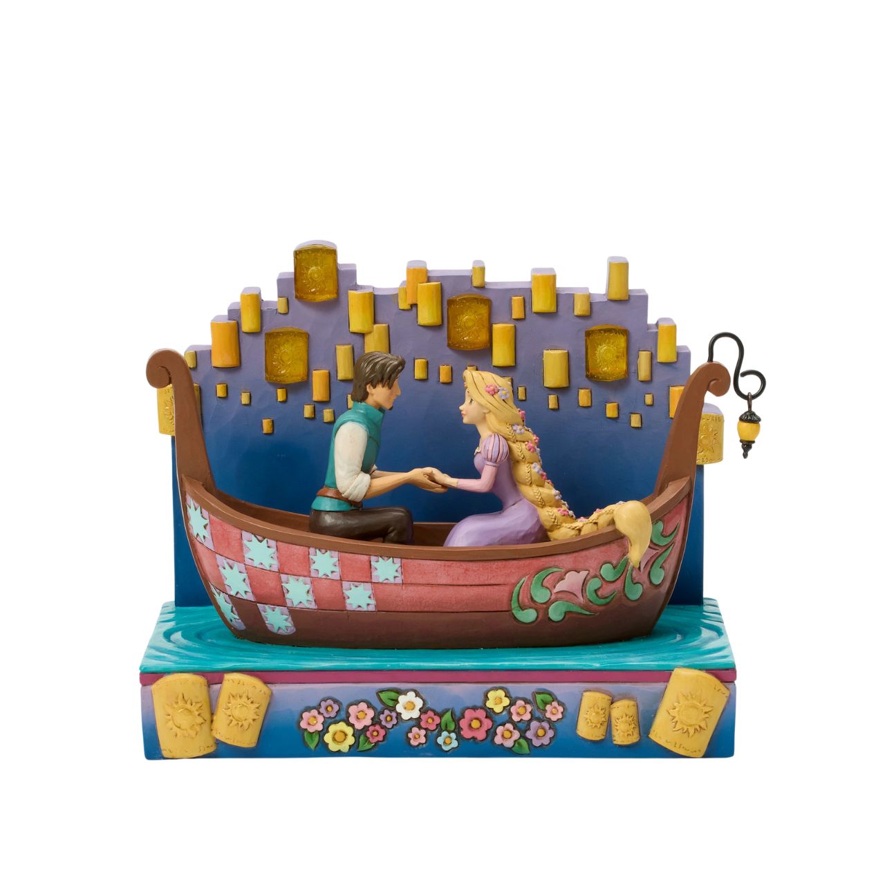 In this beautiful Jim Shore design, Rapunzel and Flynn Rider share a romantic boat ride through glowing LED floating lanterns. Capturing the enchantment, Rapunzel's charm shines with flowers in her hair.