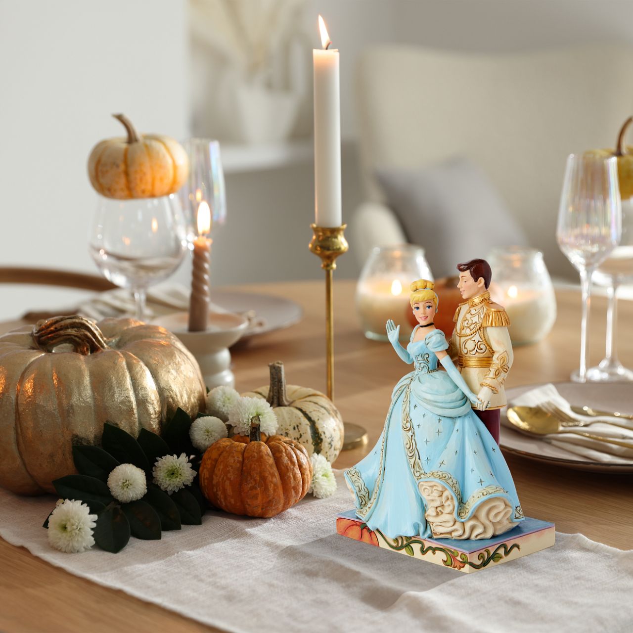 Featuring the iconic Cinderella ahead of her 75th Anniversary in 2025, with her love the Prince. Hand crafted and hand painted. From the Disney Traditions collections.