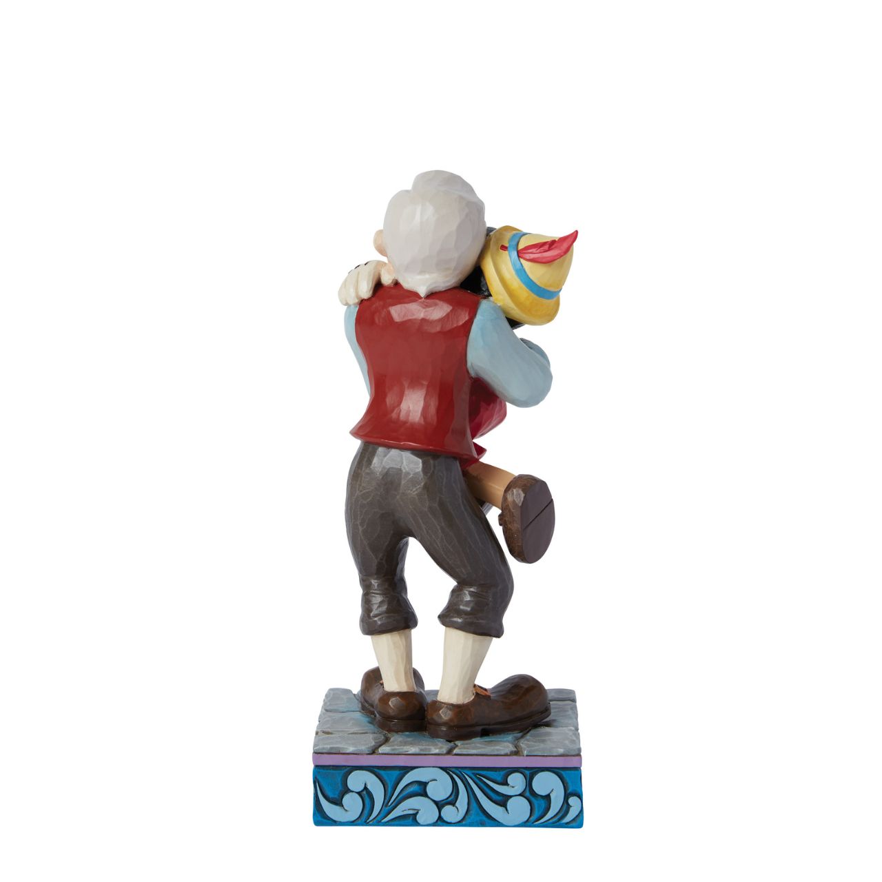 Gepetto and Pinocchio show the perfect love between a boy and his father. Hand painted for the Disney Traditions collection. Comes in a fully branded gift box.