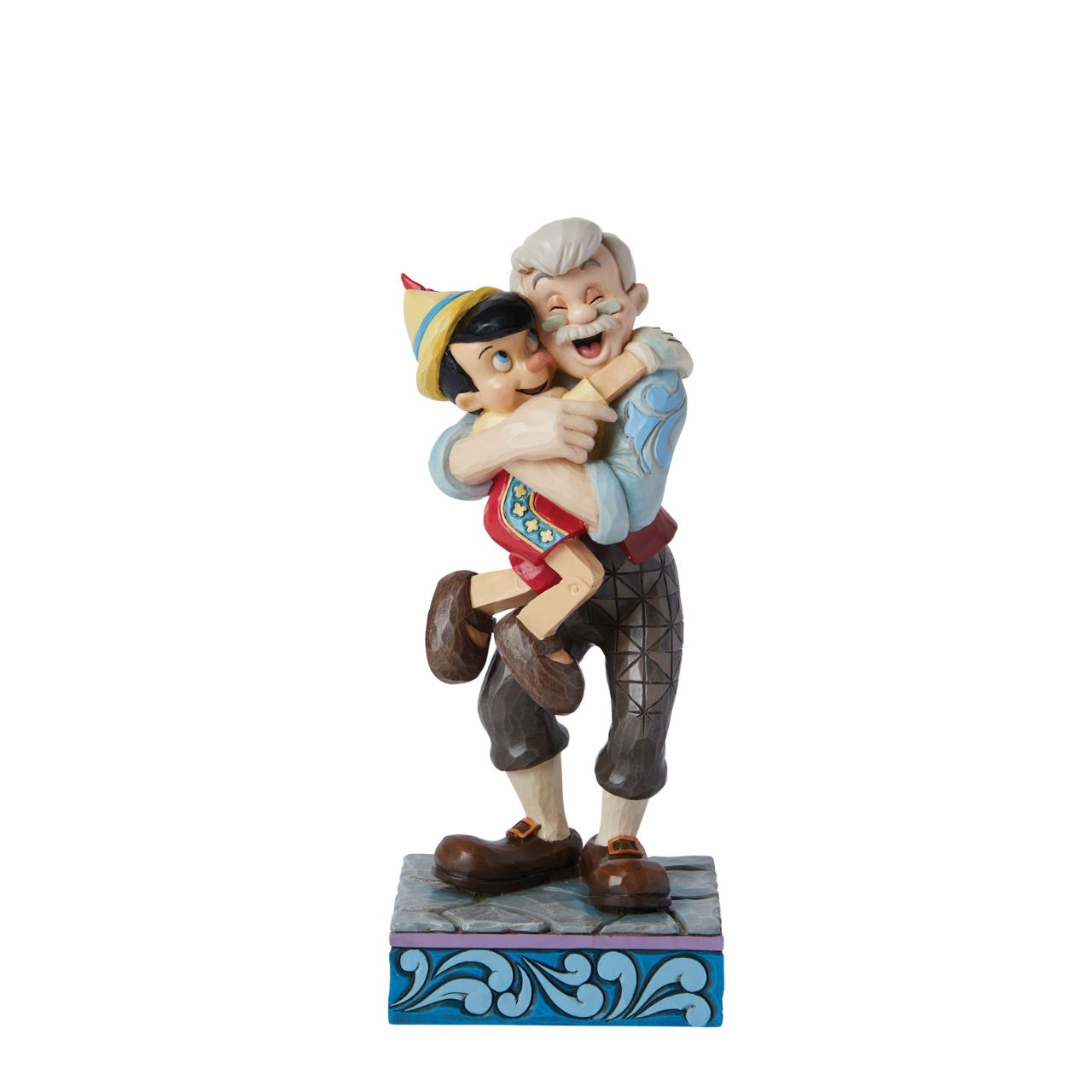 Gepetto and Pinocchio show the perfect love between a boy and his father. Hand painted for the Disney Traditions collection. Comes in a fully branded gift box.