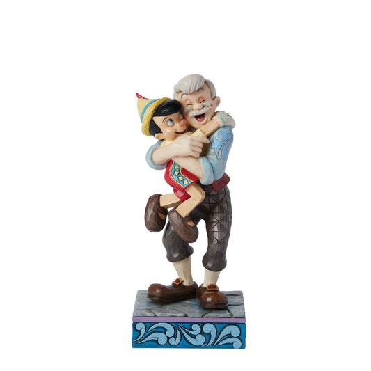 Gepetto and Pinocchio show the perfect love between a boy and his father. Hand painted for the Disney Traditions collection. Comes in a fully branded gift box.