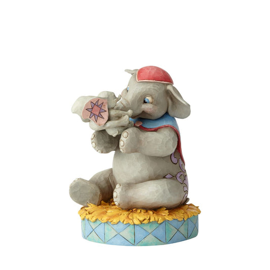 Fiercely protective and unconditionally loving, Mrs. Jumbo cherishes her big-eared baby Dumbo. Handcrafted and hand-painted in exquisite detail, this cast stone figurine by Jim Shore makes a beautiful keepsake for Mother's Day or as a new mum gift.