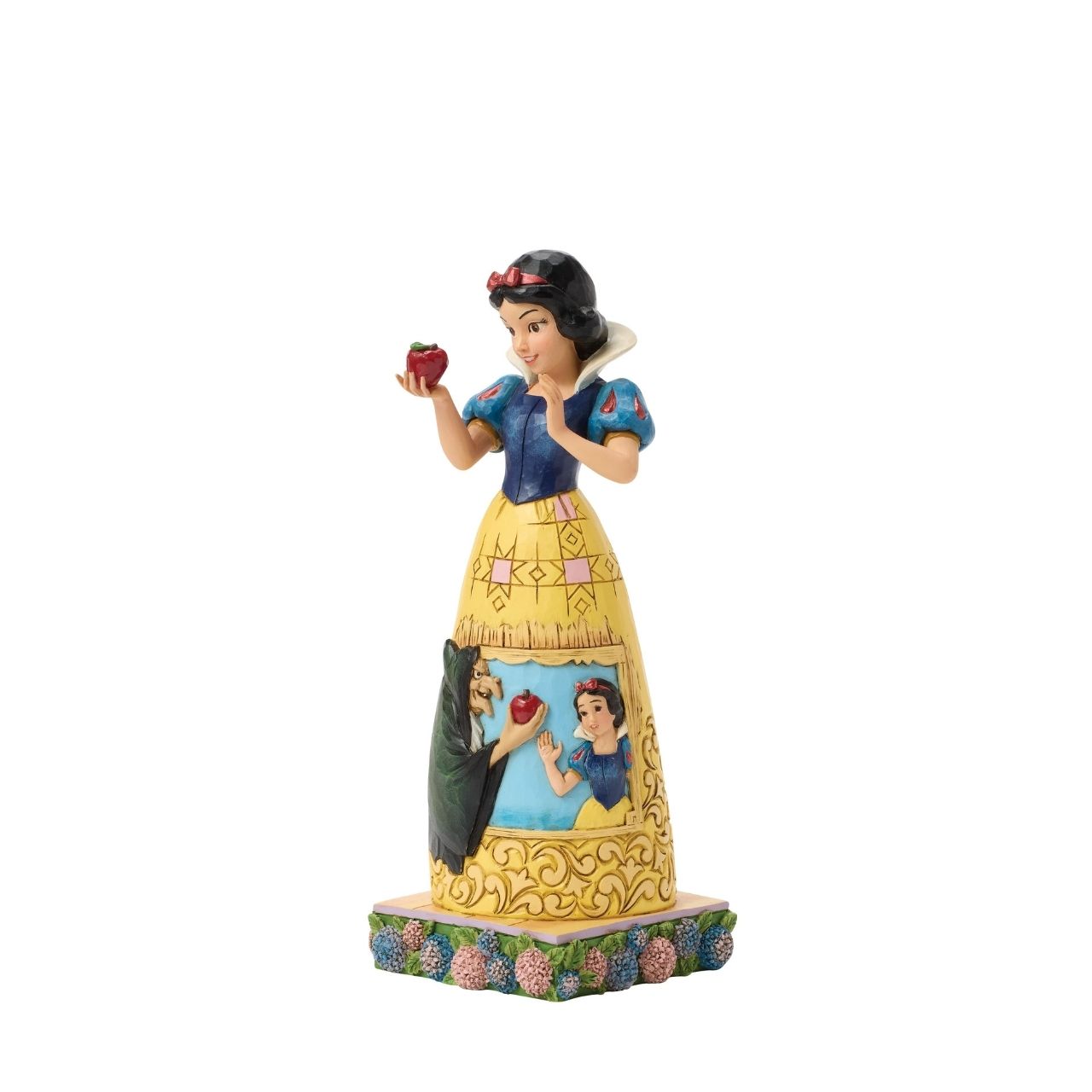 Snow White's story is told upon her gown in this sculpted scene from the creative mind of Jim Shore.