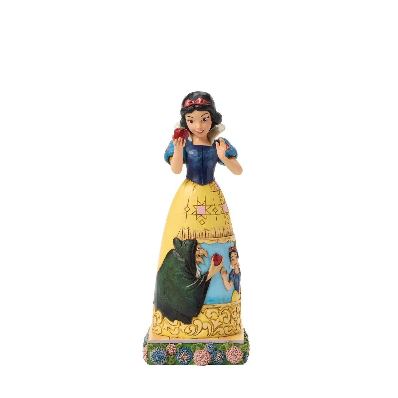 Snow White's story is told upon her gown in this sculpted scene from the creative mind of Jim Shore.