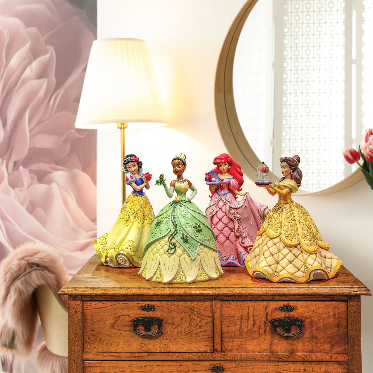 "A Precious Pearl" Second in the Series of Deluxe Figurines, The Enchanted Princess Series, is this striking 40cm Ariel Figurine. Thanks to the magic of a mysterious sea witch, Ariel The Little Mermaid, grows legs to walk on land. This sparkling Jim Shore figurine features the princess at her prettiest, her gown fitted with shells and jewels, she holds an oyster with a pearl.