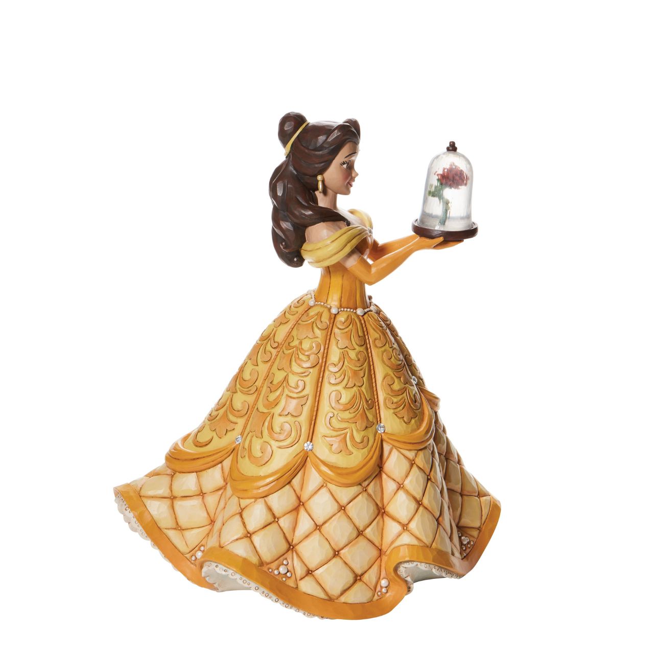 First in a Series of Deluxe figurines (The Enchanted Princess Series.) Designed by Jim Shore in celebration of Beauty and the Beast's 30th Anniversary is this striking 38.0cm Belle figurine, Belle looks stunning in her characteristic golden ball gown, embellished with pearls and swarovski crystals.