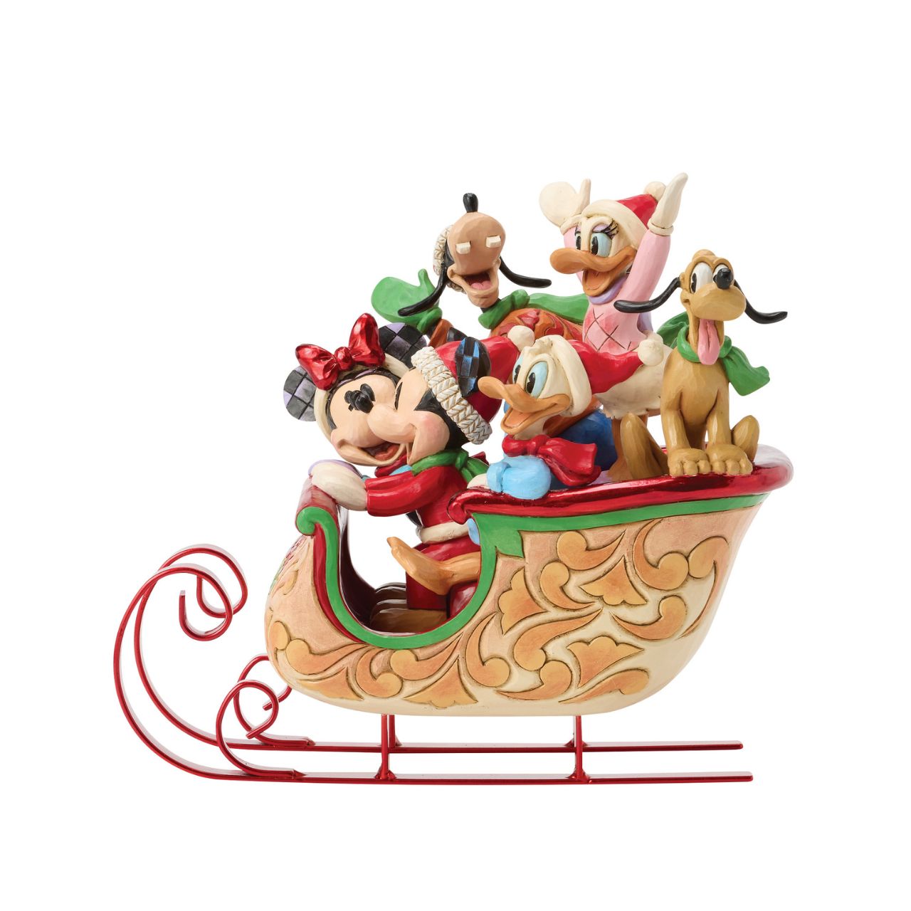 Celebrate the season with Jim Shore's enchanting Christmas sleigh ride featuring Mickey, Minnie, Donald, Daisy, Goofy, and Pluto bundled together in a beautifully crafted sleigh. Decorated with vibrant rosemaling patterns and gleaming metal runners.