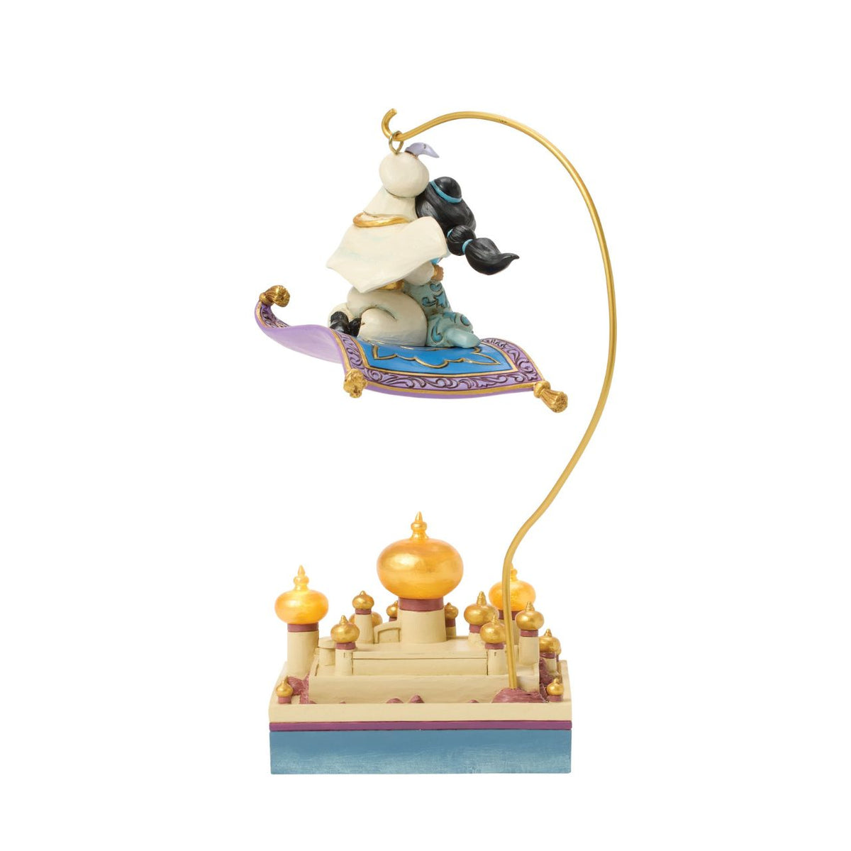 Aladdin and Jasmine soar above Agrabah on the magic carpet in this breath-taking Jim Shore scene. With an LED palace glowing below them, the pair captures the romance and wonder of Disney's unforgettable adventure.