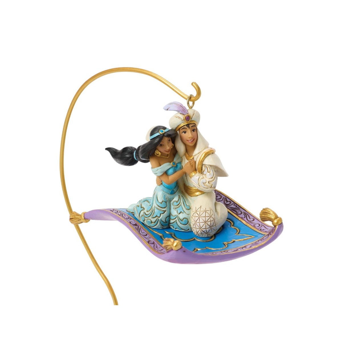 Aladdin and Jasmine soar above Agrabah on the magic carpet in this breath-taking Jim Shore scene. With an LED palace glowing below them, the pair captures the romance and wonder of Disney's unforgettable adventure.