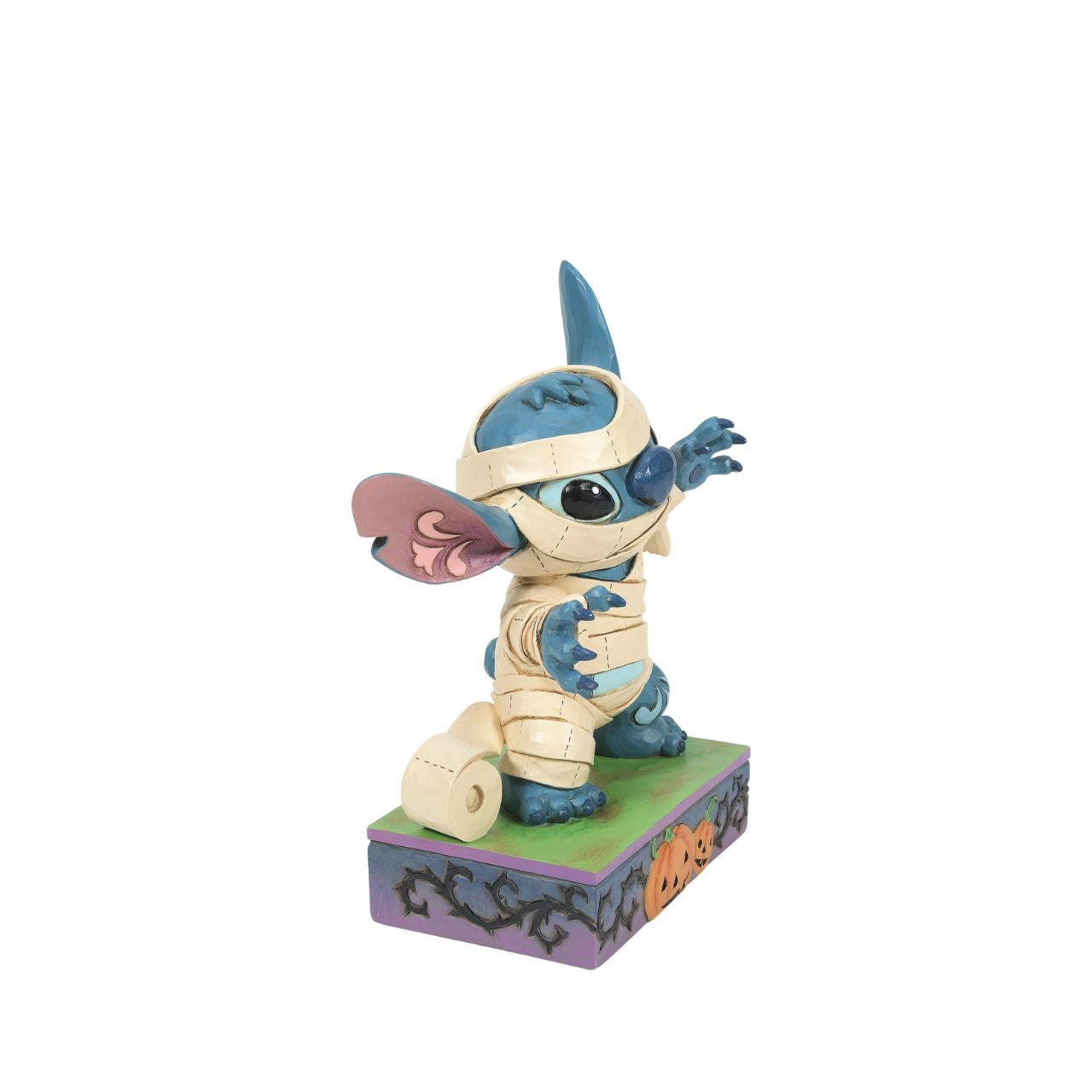 Stitch is ready for Halloween in his cute Mummy costume. The perfect spooky gift for any Disney Traditions fan. Designed by Jim Shore and hand painted.