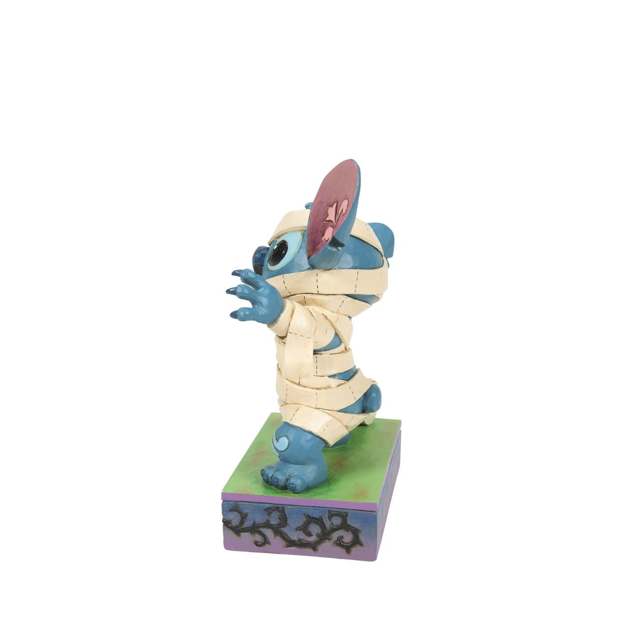 Stitch is ready for Halloween in his cute Mummy costume. The perfect spooky gift for any Disney Traditions fan. Designed by Jim Shore and hand painted.