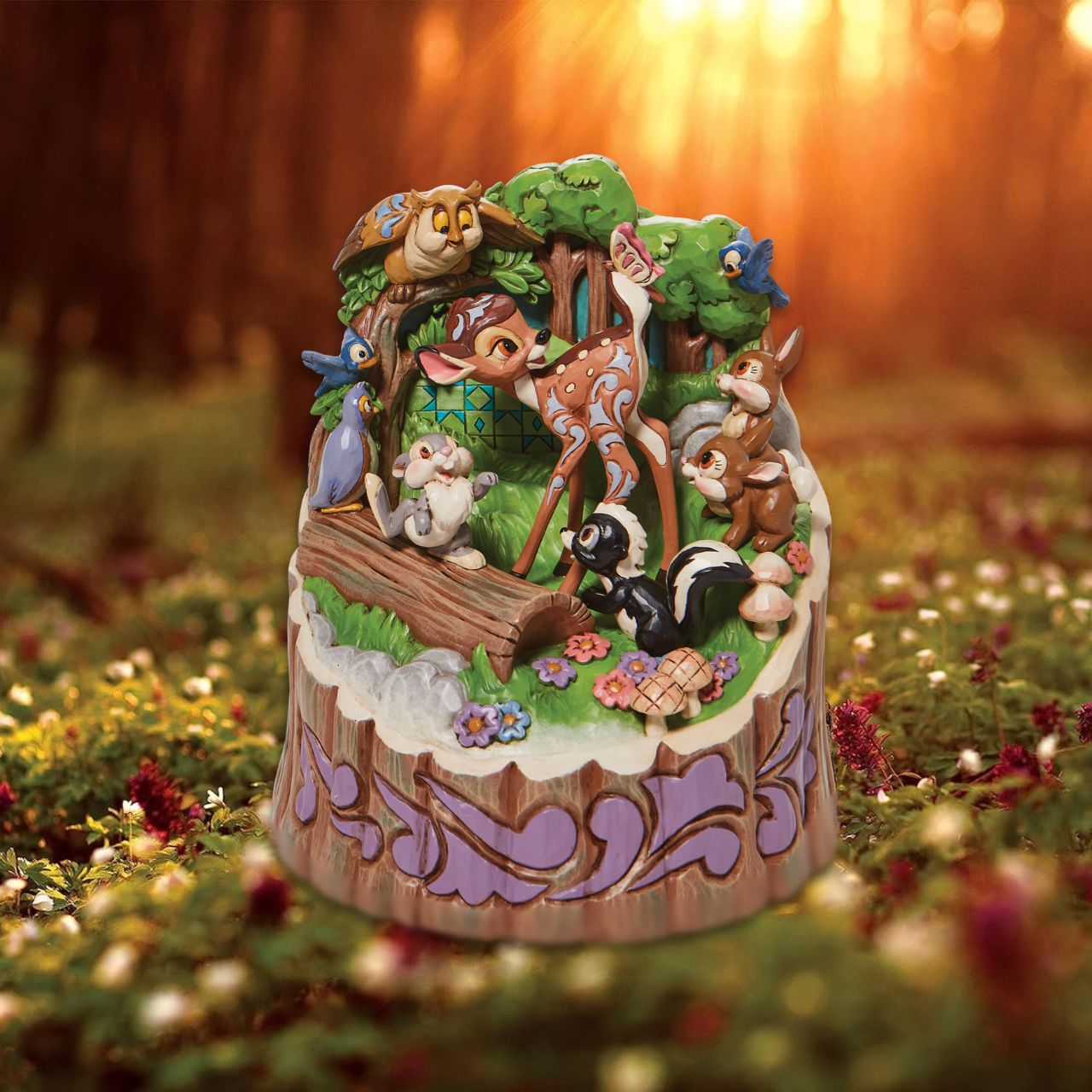 Marvel in the meadow for Bambi's 80th Anniversary celebration. With Jim Shore patterns and details throughout the carved masterpiece, this Disney Traditions figurine displays Bambi and friends Flower and Thumper, smiling together on a Spring day.