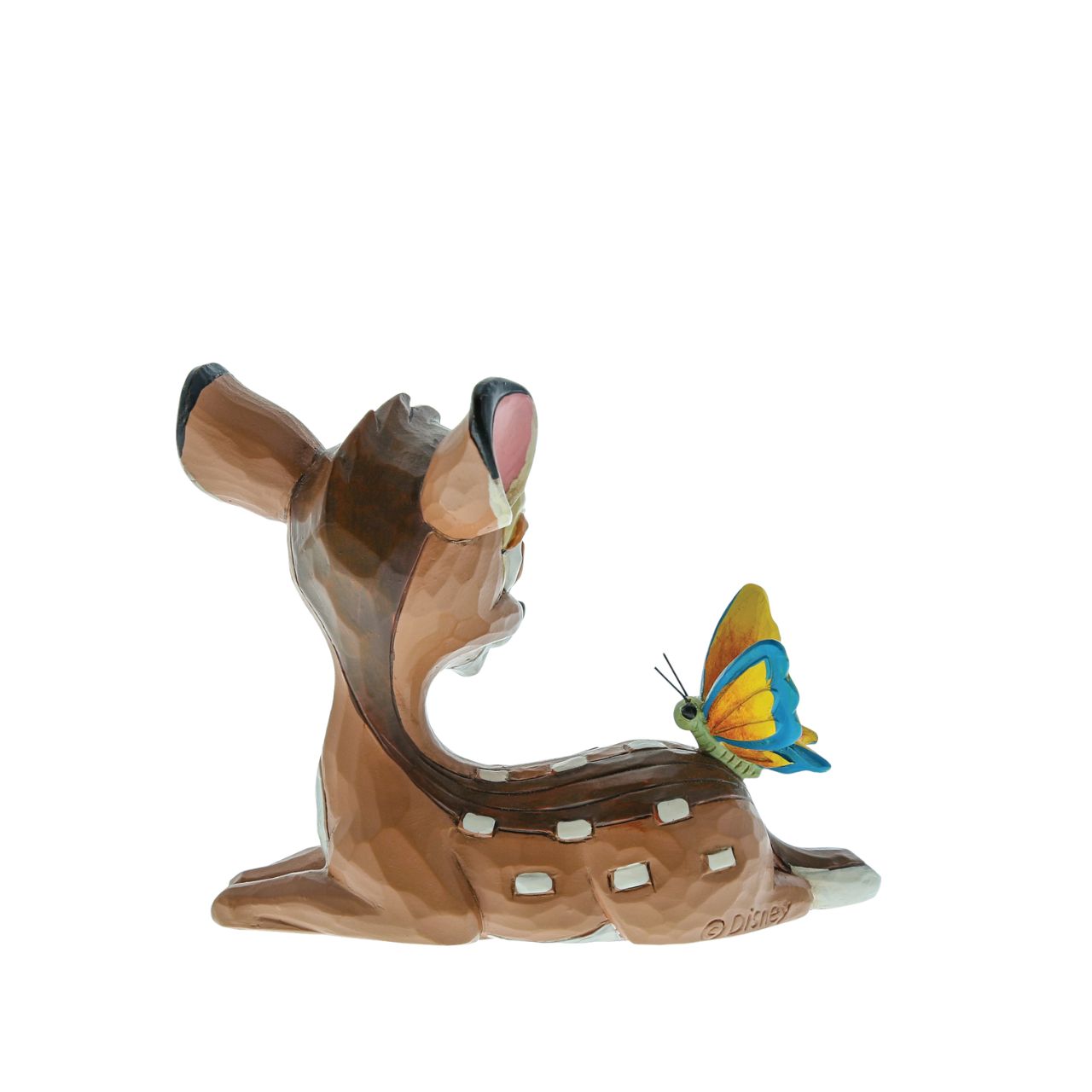 Disney Traditions Bambi Mini Figurine  With pleasing rosemaling detail and beautiful craftsmanship, this lovely Disney piece is a prize from the forest. Jim Shore celebrates the 80th anniversary of Bambi with this sweet miniature, as the peaceful deer sits gracefully with a butterfly.