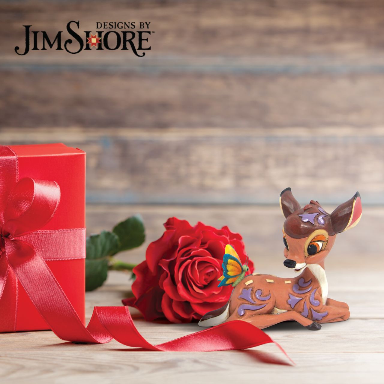 Disney Traditions Bambi Mini Figurine  With pleasing rosemaling detail and beautiful craftsmanship, this lovely Disney piece is a prize from the forest. Jim Shore celebrates the 80th anniversary of Bambi with this sweet miniature, as the peaceful deer sits gracefully with a butterfly.